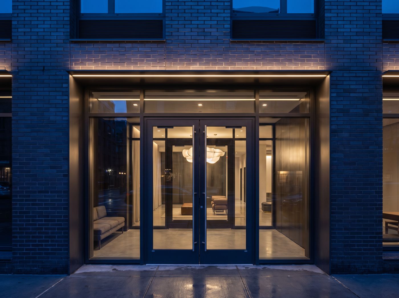 Refreshed entrance and lobby of a New York City residential building