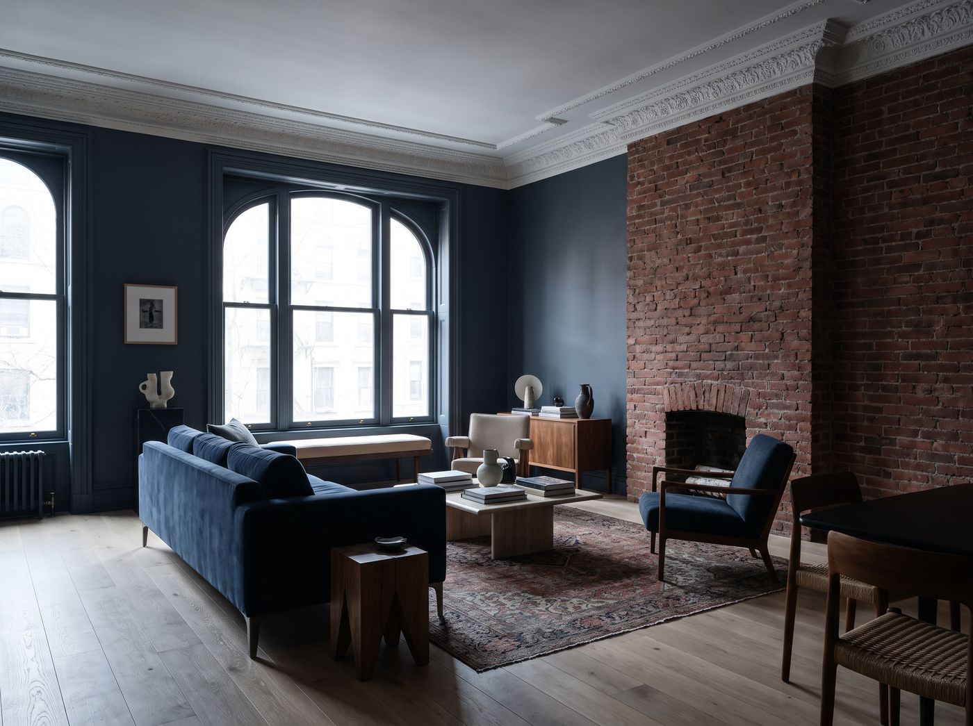Renovated New York City apartment interior with restored prewar detail and new finishes